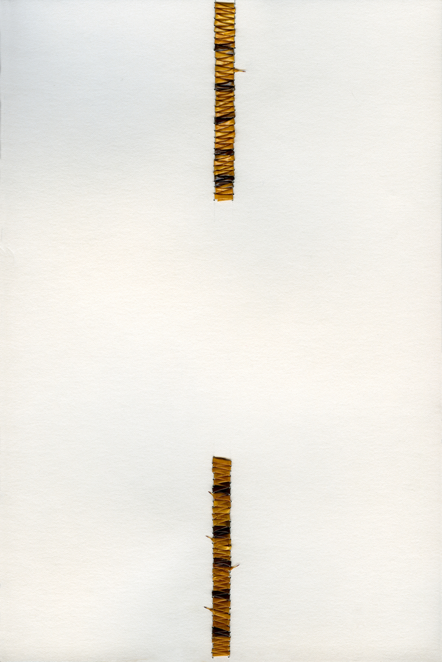 two lines of burnt orange quillwork reach out but do not met each other on a cream paper.