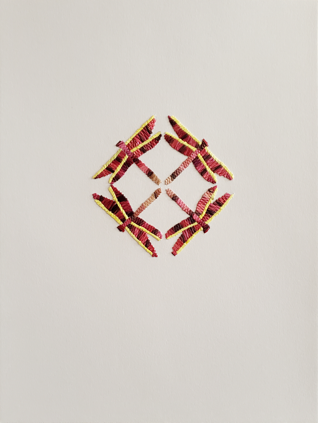 Lines of quillwork depict four dragonflies arranged in a diamond pattern