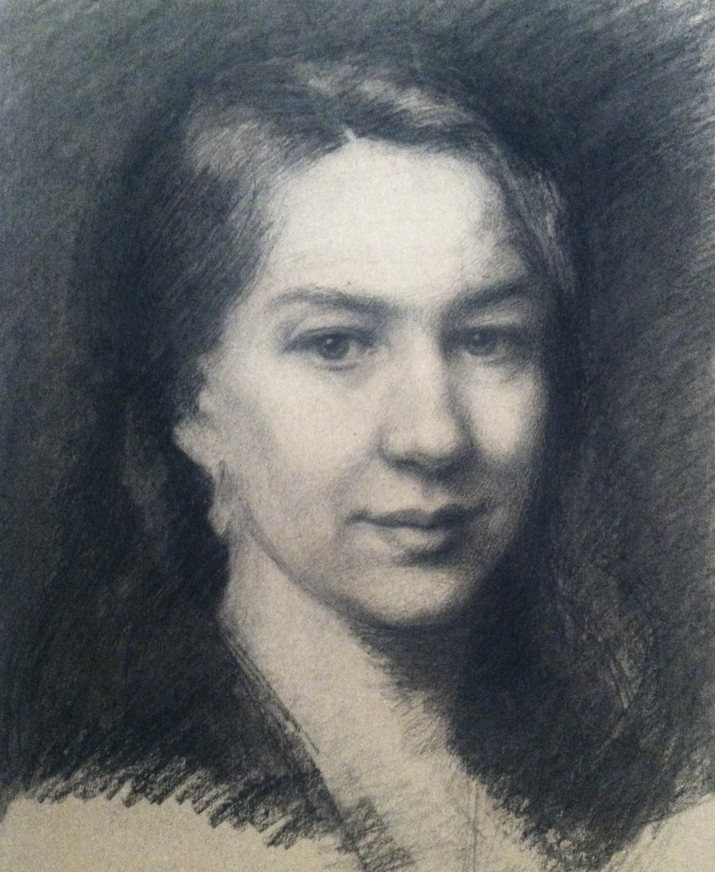 Self portrait in charcoal on handmade paper