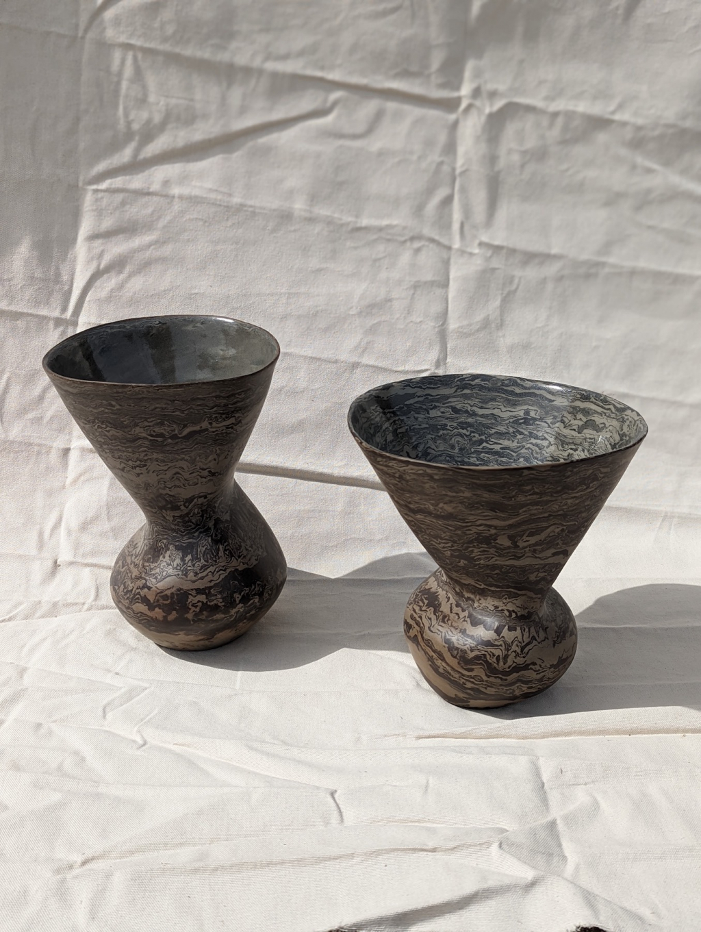 2 wide grey and black marbled vases