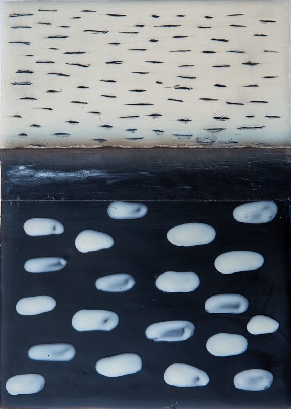 Encaustic black and white painting on panel with carved graphic lines and dashes
